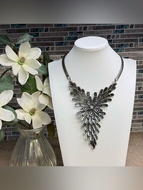 Beautiful silver feather statement necklace